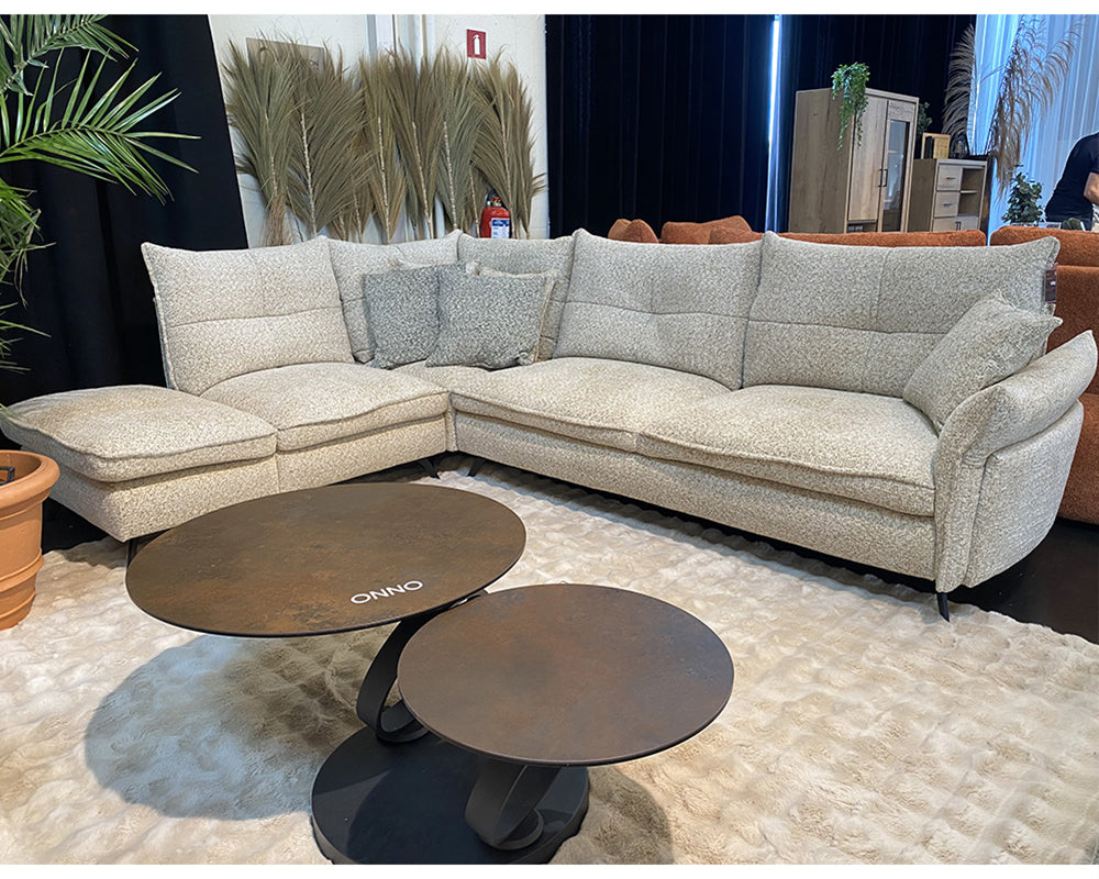 Beige fabric corner sofa 291x220 - Wildy