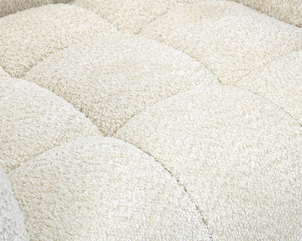 Détail assise capitonné – Bery – tissu effet bouclette blanc