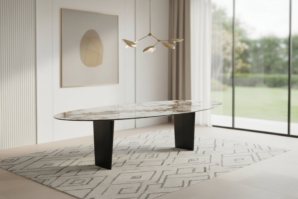 Goliath grande table céramique marbre ovale – vue en ambiance design avec chaises