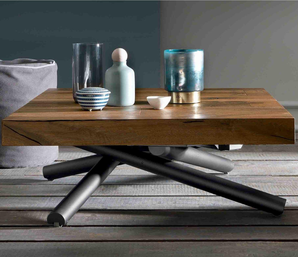 table basse relevable extensible baissé avec de la decoration sur le plateau