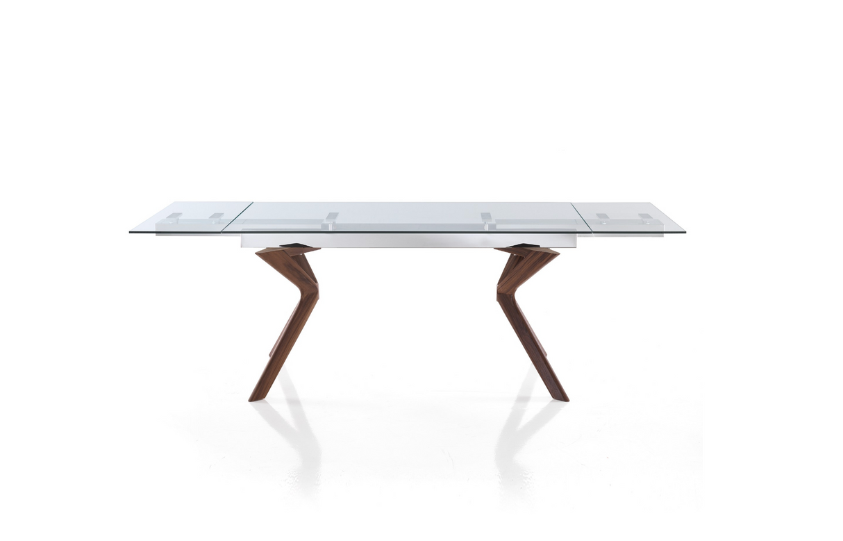 une table en verre extensible sur un fond blanc