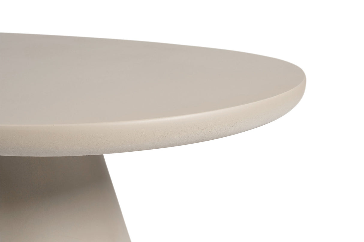 table forme galet de salle à manger en béton ciré beige