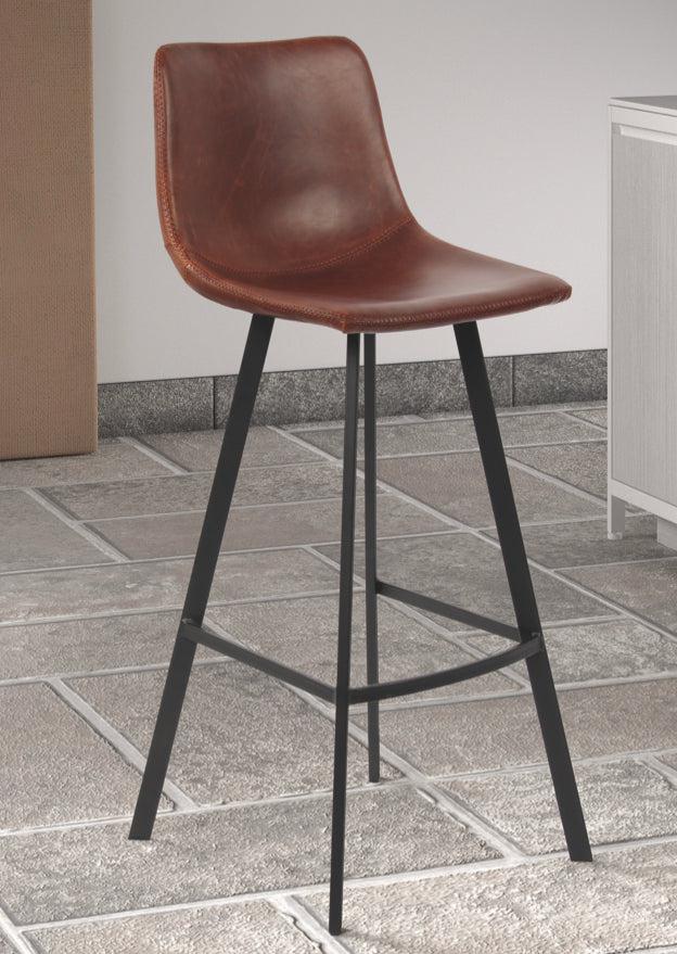 Tabouret de bar industriel pieds métal cognac sur un carrelage gris - SOUFFLE D'intérieur