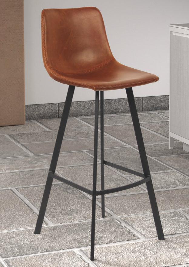 Tabouret de bar industriel pieds métal marron sur un carrelage gris clair - SOUFFLE d'intérieur