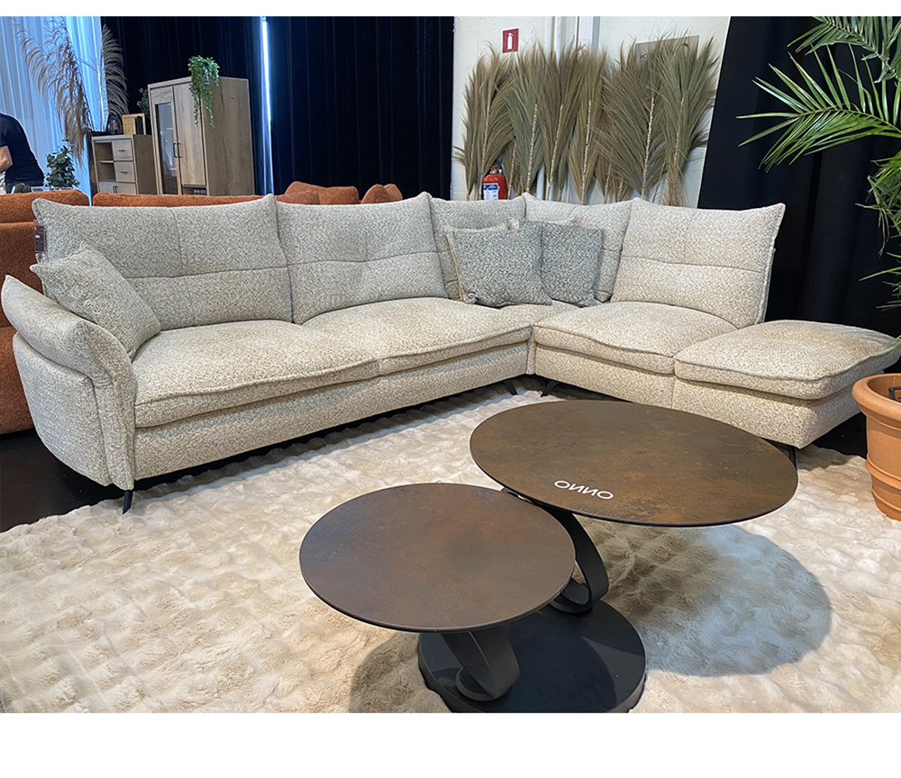 Beige fabric corner sofa 291x220 - Wildy