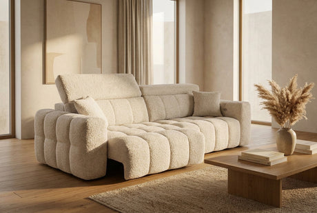 Canapé Féline avec une têtière relevée et une assise coulissante électrique déployée – vue de trois quarts