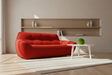 canape 3 places rouge arrondi dans le magasin de meuble à Yerres