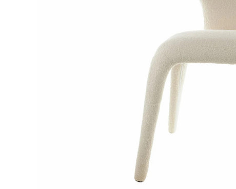 chaise beige en tissu bouclette de salle a manger