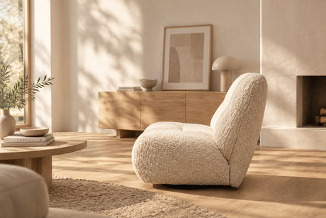 Fauteuil Lysandra en bouclette, base pivotante en métal noir