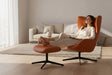 fauteuil en cuir relax avec pouf