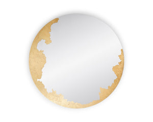 miroir rond doré au dessus d'une cheminée - Souffle d'intérieur