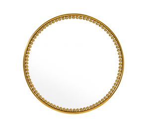 miroir rond doré sur un fond blanc