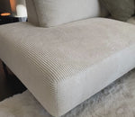 Canapé d'angle beige en tissu