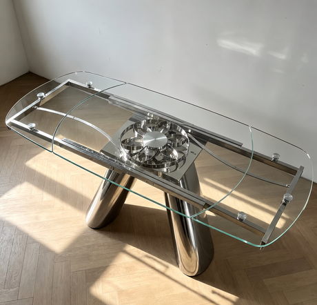 Table en verre extensible Landy vue de dessus, plateau en verre trempé et mécanisme central en inox chromé