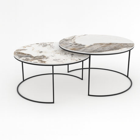 Table basse gigogne ronde en céramique effet marbre Calacatta – modèle Vitaly par Souffle d’Intérieur, design contemporain avec double plateau modulable sur un fond blanc
