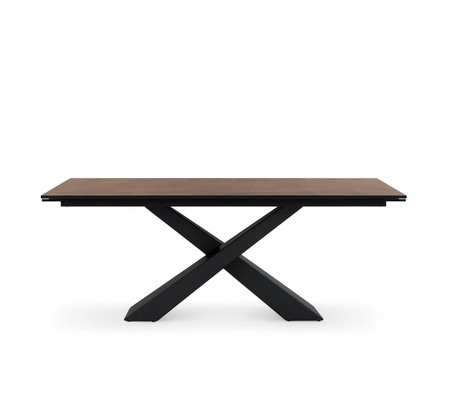 table extensible en céramique effet métal rouille bronze de la marque lievens sur fond blanc vue de face 