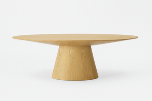 Table ovale en bois chêne clair avec pied central sur fond blanc
