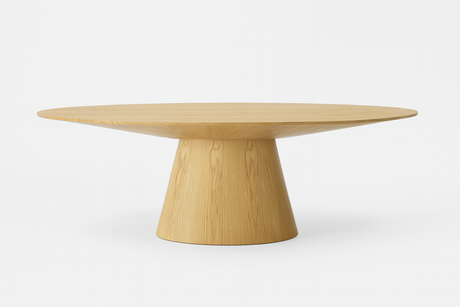 Table ovale en bois chêne clair avec pied central sur fond blanc
