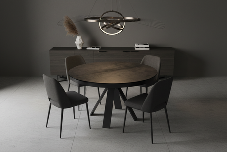 Table ronde acier foncé en ambiance contemporaine