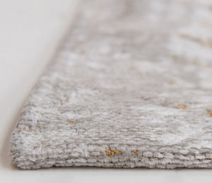 Tapis design salon gris tacheté orange - Salgueiro rugs - Souffle d’Intérieur