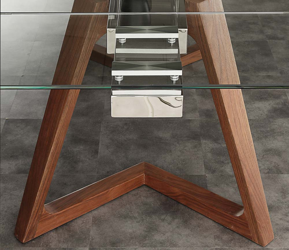Table Ken design italien - plateau verre et pieds bois noyer sculptés
